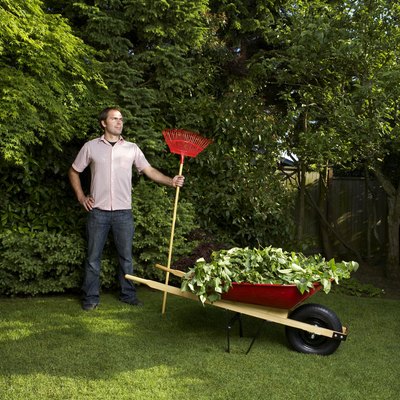 Man standing with rake