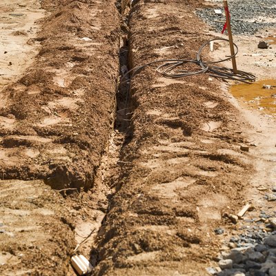 Buried cables in utility trench on construction site