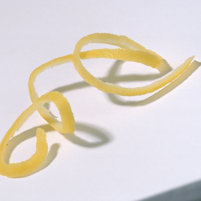 Spiral lemon peel on white background