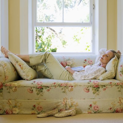 Woman sleeping on sofa
