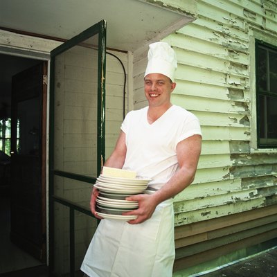 Cook with dishes outdoors