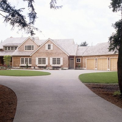 A smooth concrete driveway adds beauty and functionality to a home