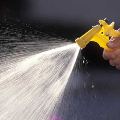 Spraying a Garden Hose
