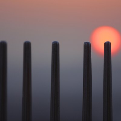 Sunset behind posts