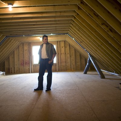 Man in empty attic