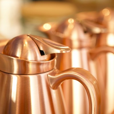 Row of copper coffeepots