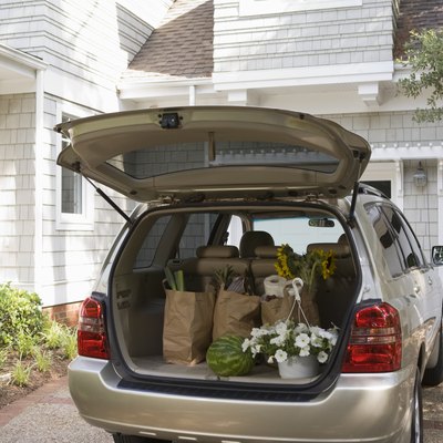Mini-van with groceries and flowers
