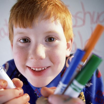 Boy with markers