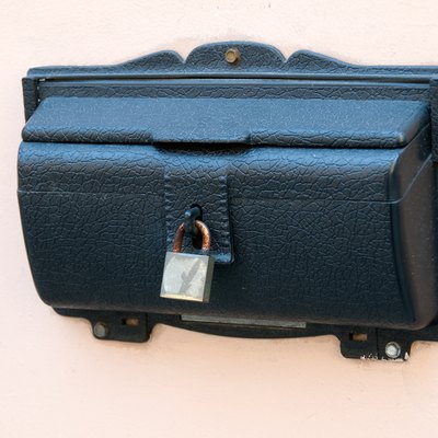 Locked box on wall