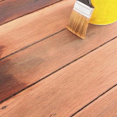 brush tin and decking oil for a timber deck
