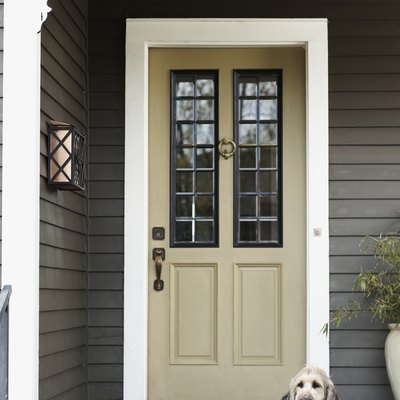 Dog lying on front porch