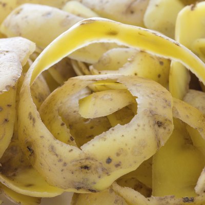 Fresh potato skins or peels  background
