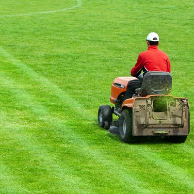 Mowing grass in stadium