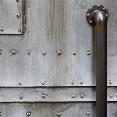 grunge metal door with door handle