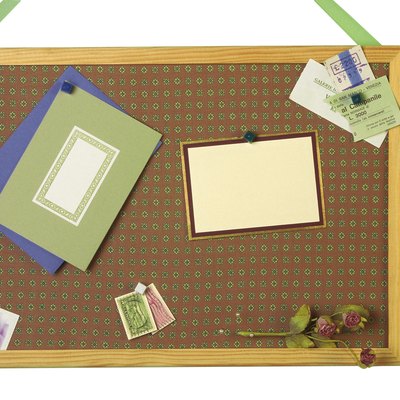 Greeting cards and memorabilia on bulletin board