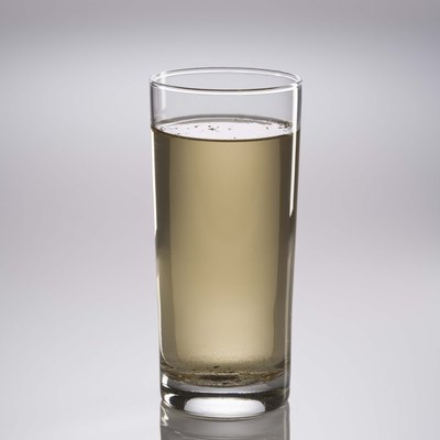 Glass of dirty water