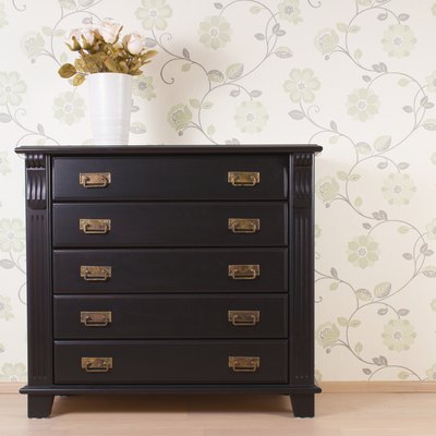Bedroom wall with classic furniture and roses