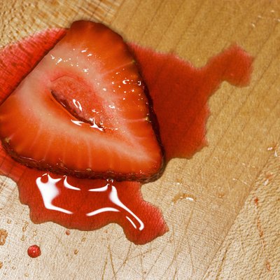 Sliced strawberry on wood cutting-board