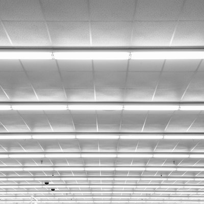 Fluorescent lights on ceiling, low angle view