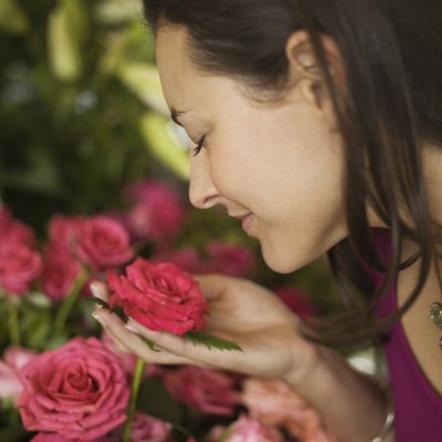 Woman smelling flowers