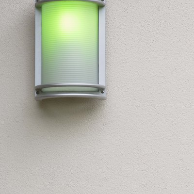Wall sconce with green light
