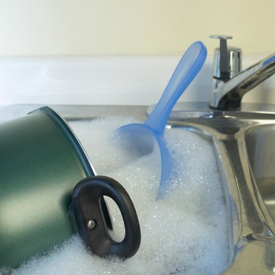 Dishes in sink with suds