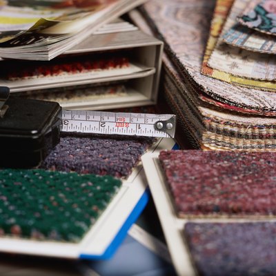 Measuring tape and stacks of carpet samples