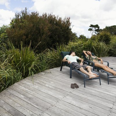 Couple relaxing on deck