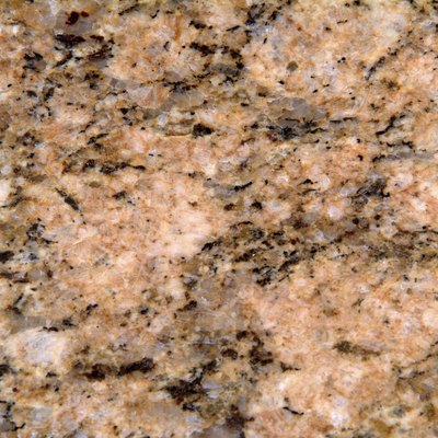 Close-up of surface texture of pink granite rock