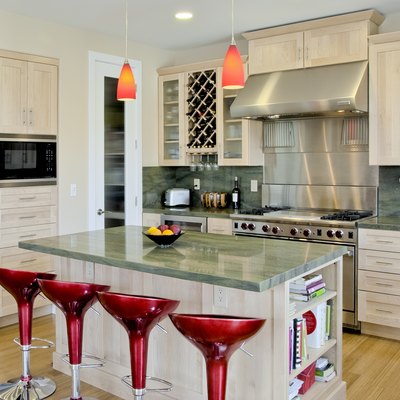 Custom Kitchen with Island and Red Stools