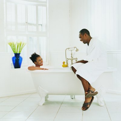 Couple Sitting in a Bathroom