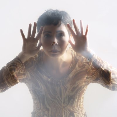 Woman looking through glass