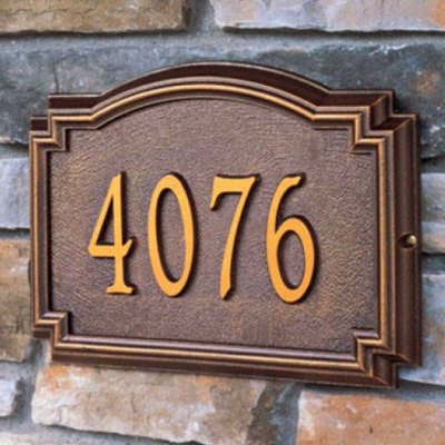 House numbers on brick.