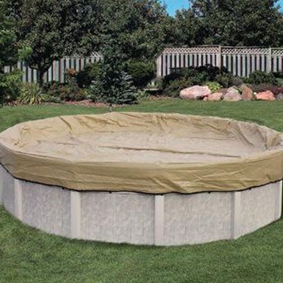 A standard debris cover for an above-ground swimming pool.