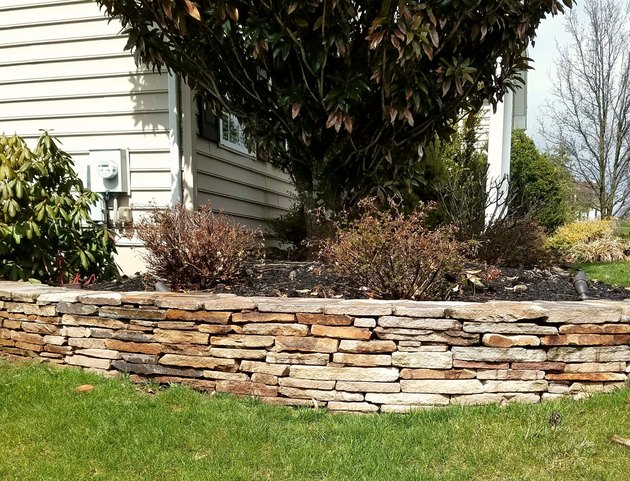 Stone retaining wall.