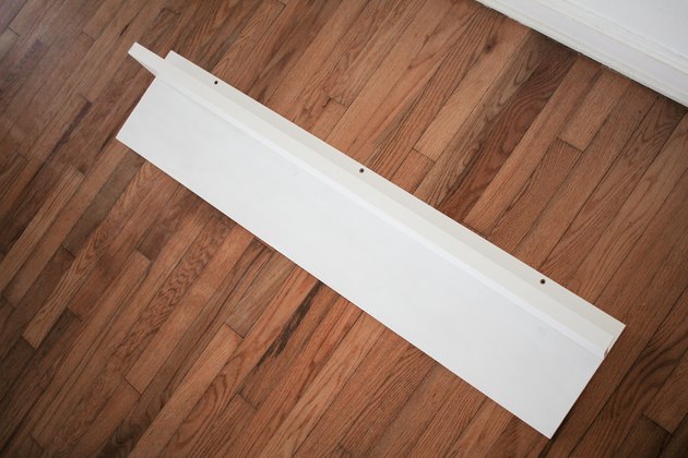 Picture ledge lined up on top of board