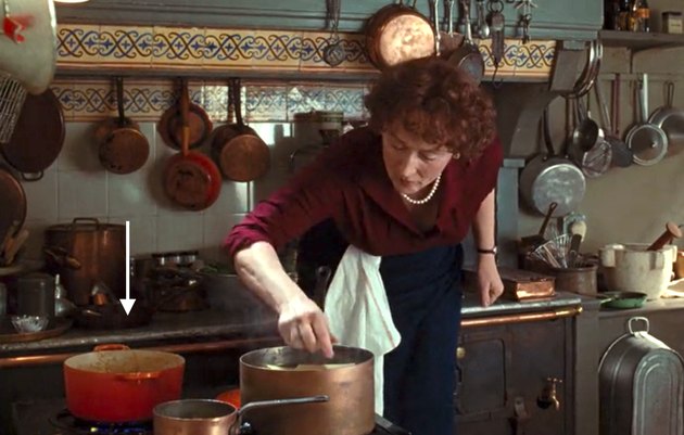 Meryl Streep as Julia Child cooking in "Julie & Julia" with a Le Creuset on the stove