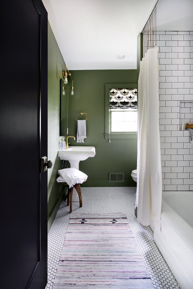 green bathroom idea with white subway tile shower