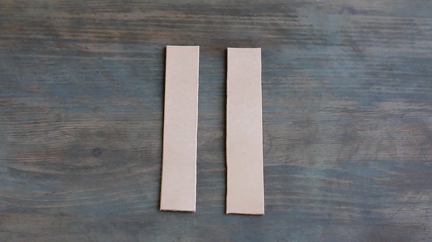 Two strips of tooling leather