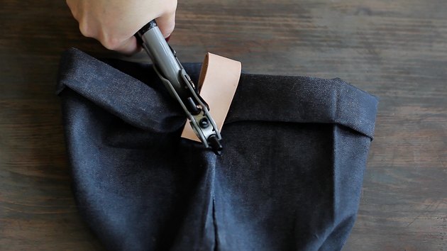 Punching hole through leather strip