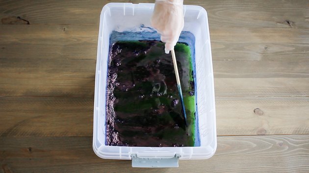 Pushing indigo flower aside
