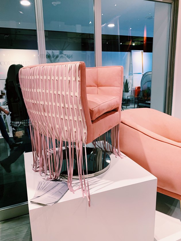 Nathan Anthony accent chair with woven fringe detail on back