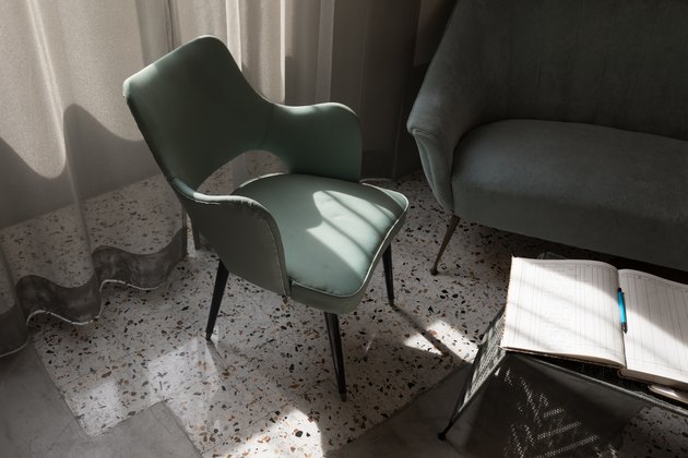 accent chairs in afternoon sunlight; tile floors