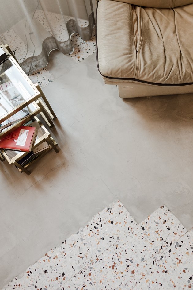 top view of chair and side table with tile flooring