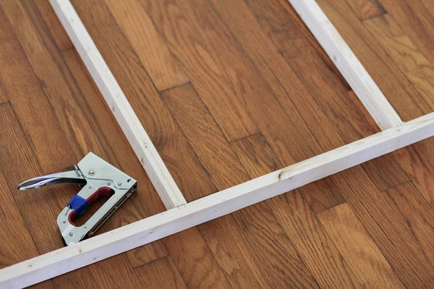 Vertical support boards stapled to