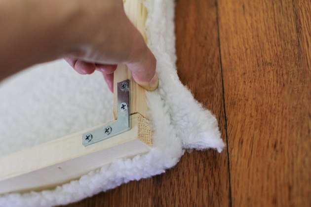 Stapling corner slit to frame