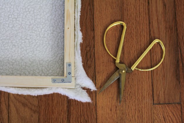 Cutting slits in the corners of the fabric