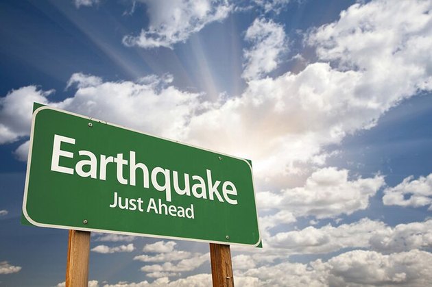 Earthquake ahead sign.