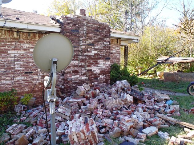 Damaged brick chimney.