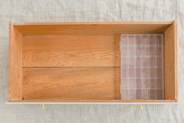 Organizing a bathroom drawer GIF